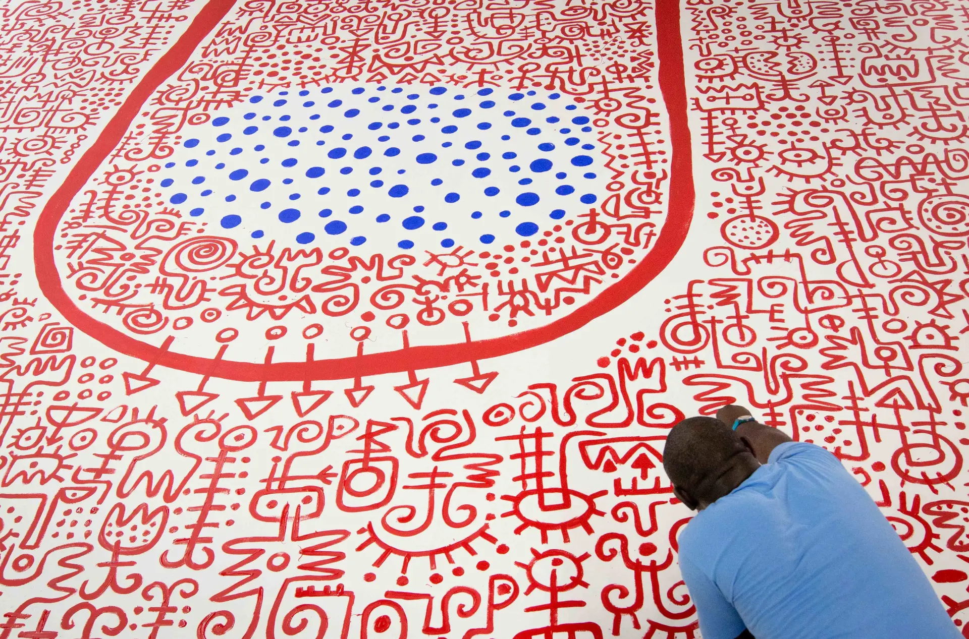 State of Beings (2013). Installation, 86 in. × 200 in. (floor), 178 in. × 41.58 in. (wall). Acrylic, vinyl and metal on wood panel and vinyl mat. Created in Apt, France, during a sculpture workshop to mark the tenth anniversary of Fondation Blachère. Image Cedit: Mabeye Deme and Victor Ekpuk