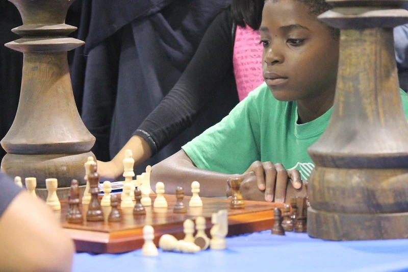 BuffSci students participating in after-school chess club