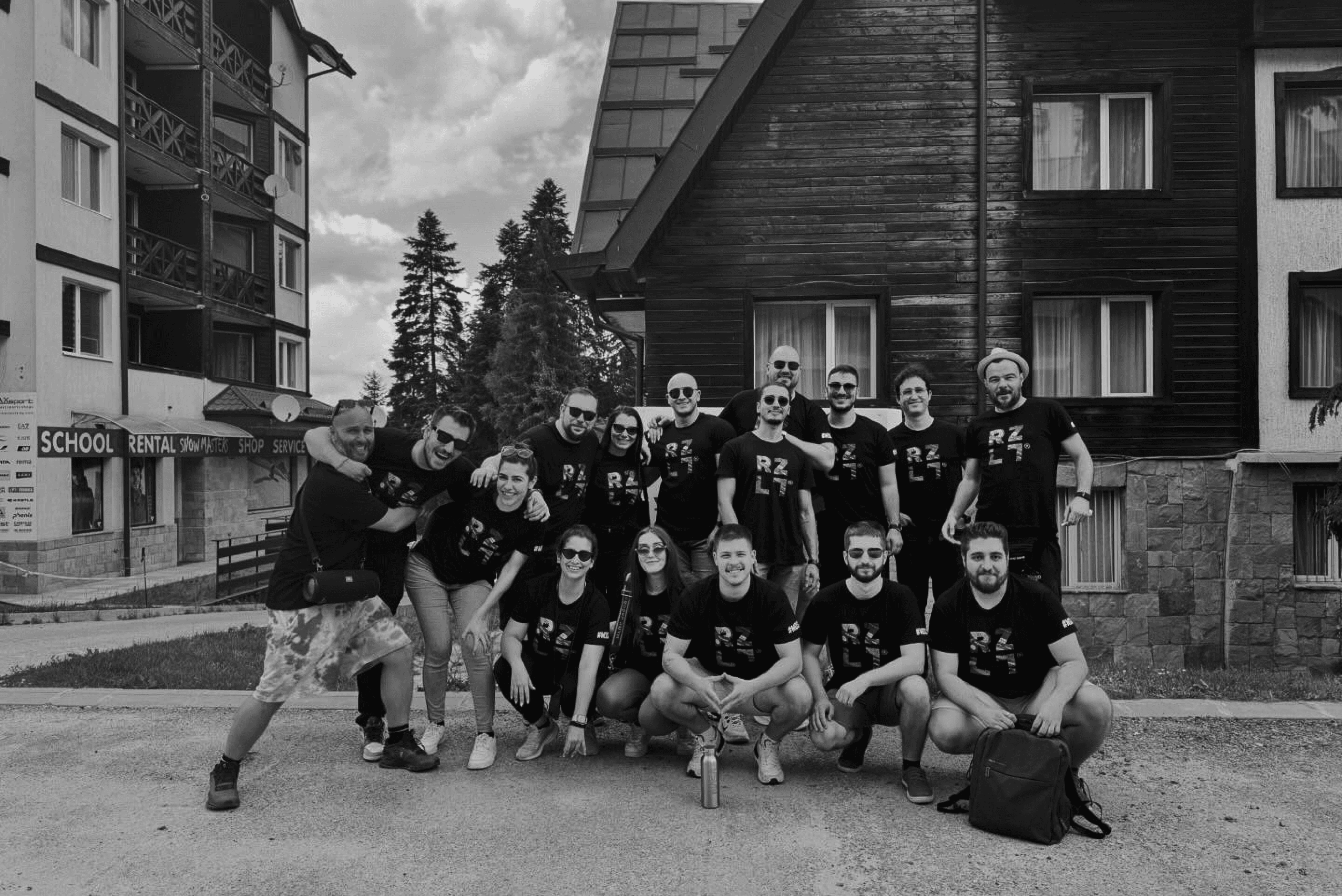 Group of people relaxing outdoors on a field or lawn