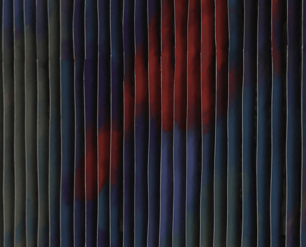 a group of women standing on top of a sandy beach