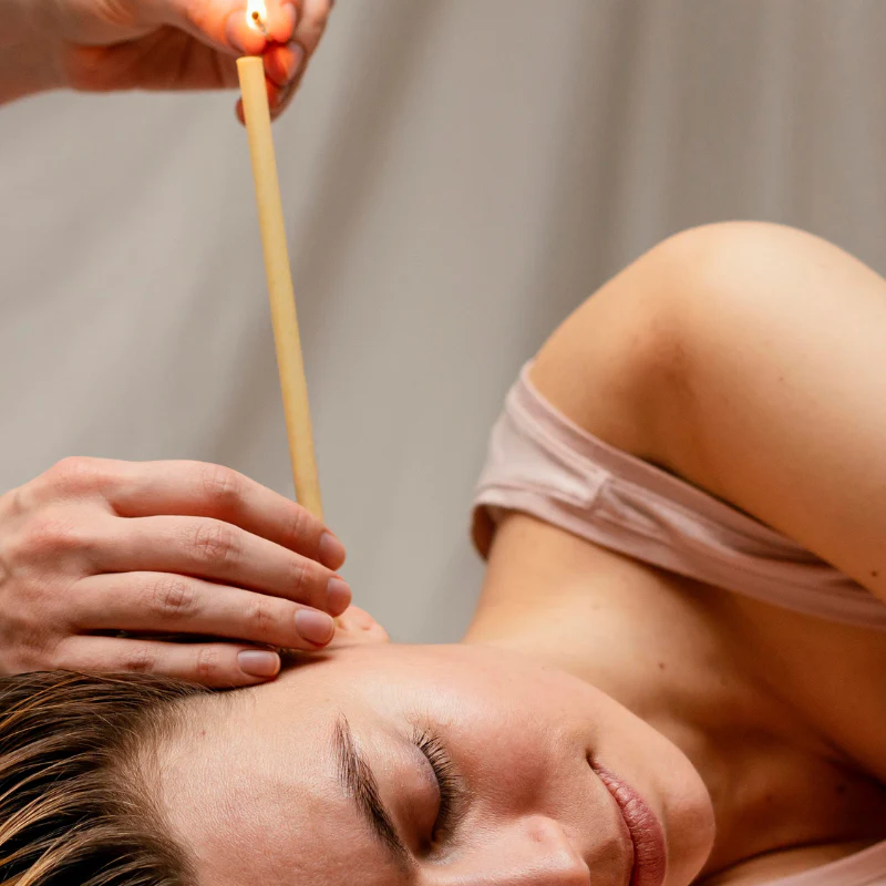 two ladies looking at a laptop and smiling