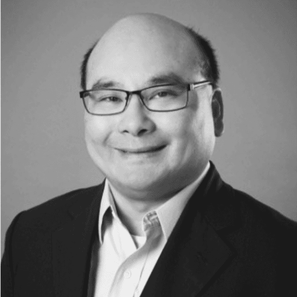 men sitting in front of their laptop computer