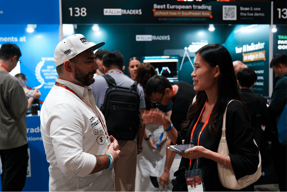 A person stands in a sandstone cave.