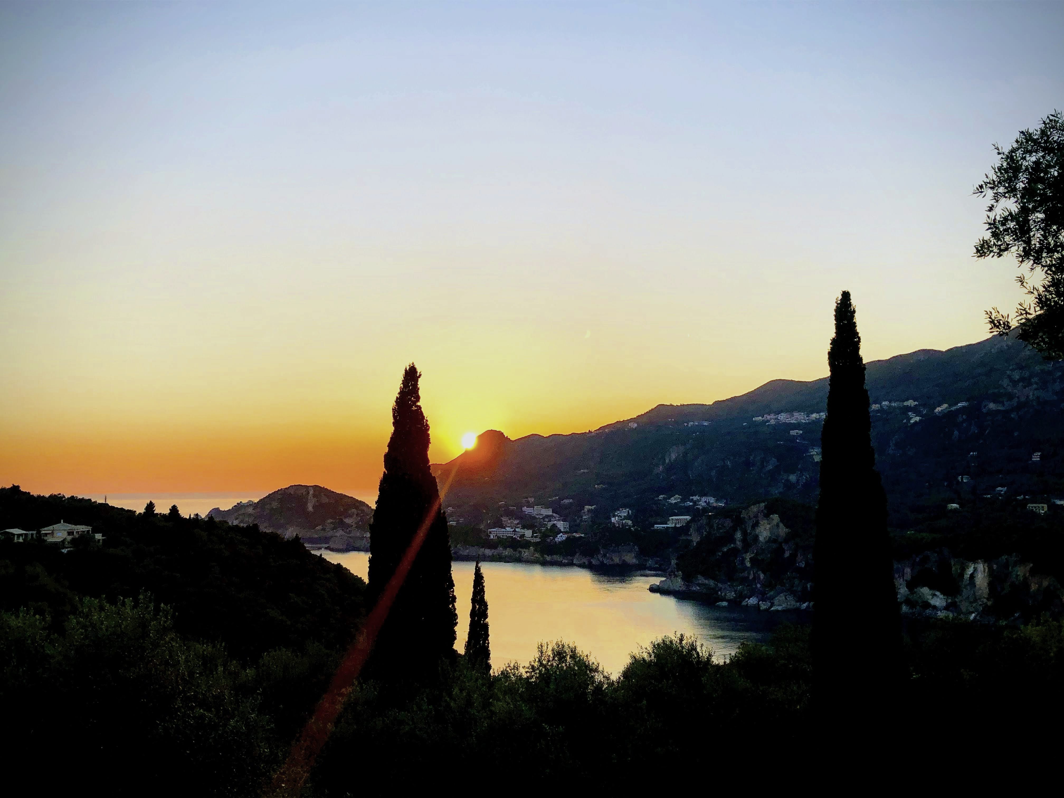 Sunset view from Villa Calivi overlooking the coastline of Liapades, Corfu