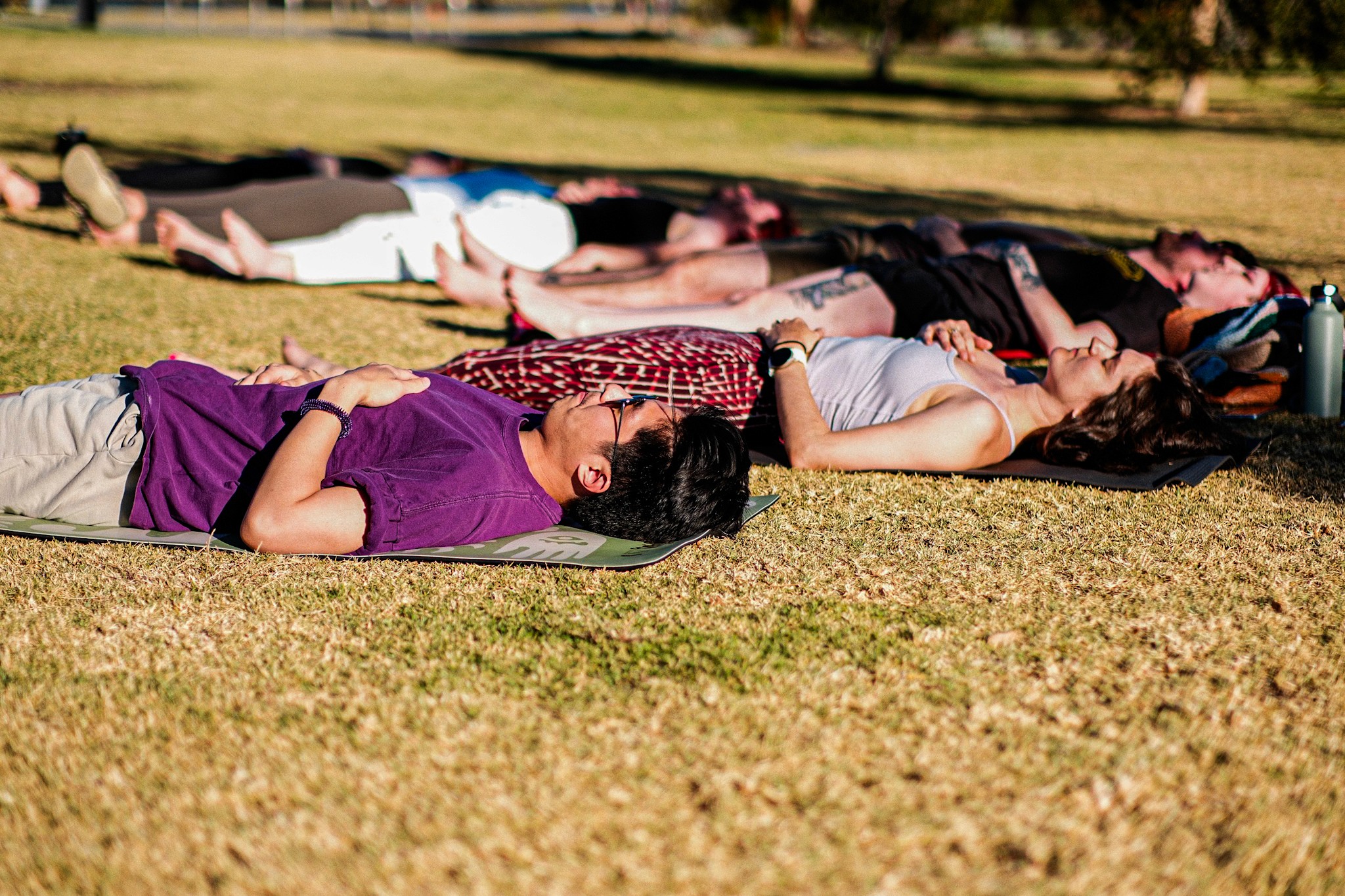 Commercial photography by JamesTheLyon for PixelSpaces — events, gigs, headshots, people, and architecture — park yoga namaste mindfulness grounded local community 