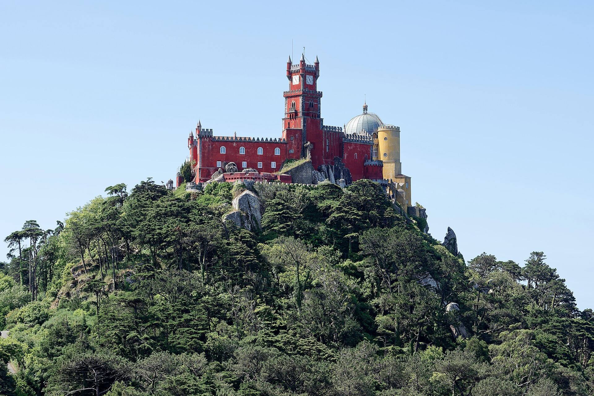 an aerial view of a desert with rocks and sand