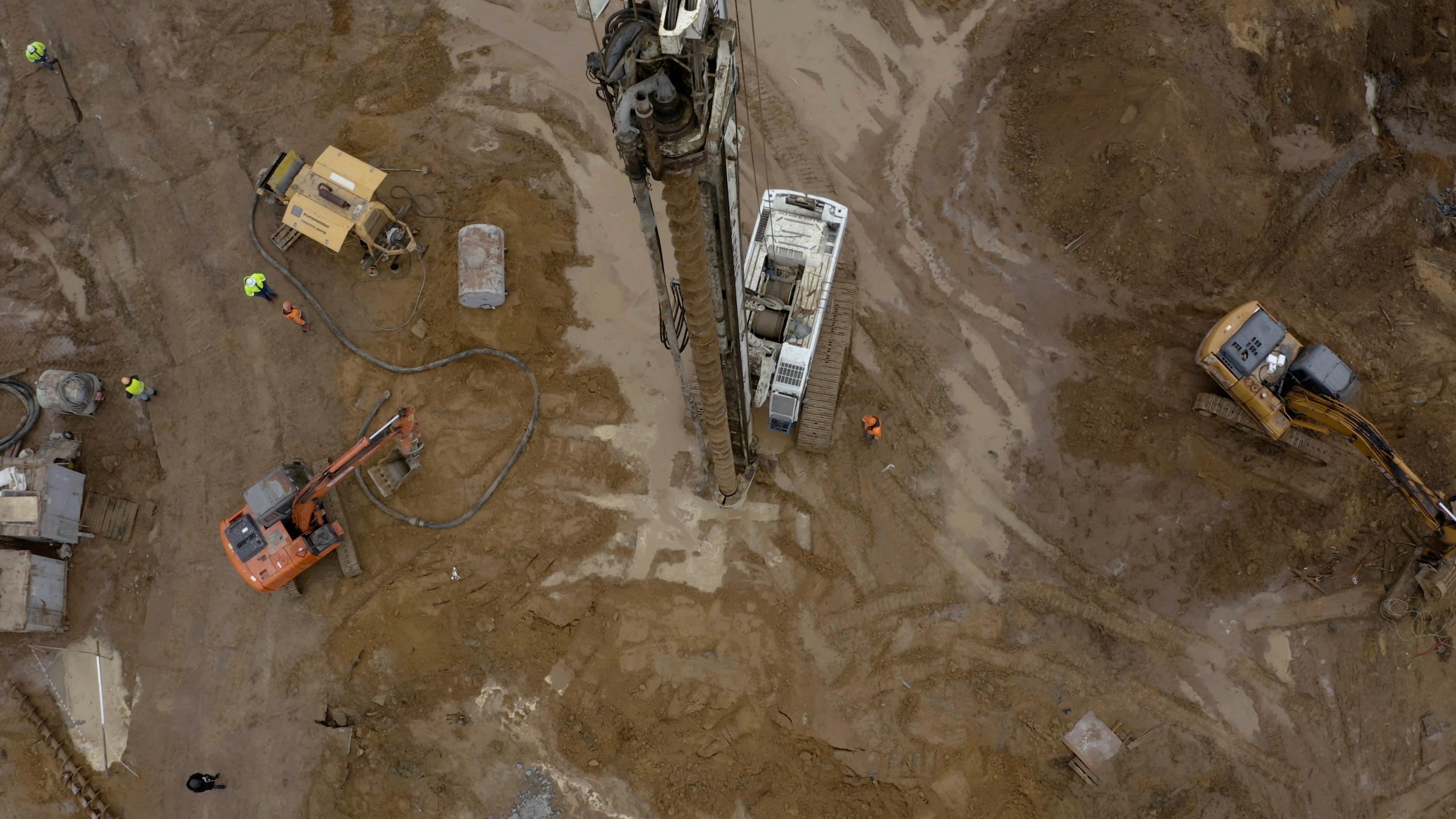 brown soil with green grass
