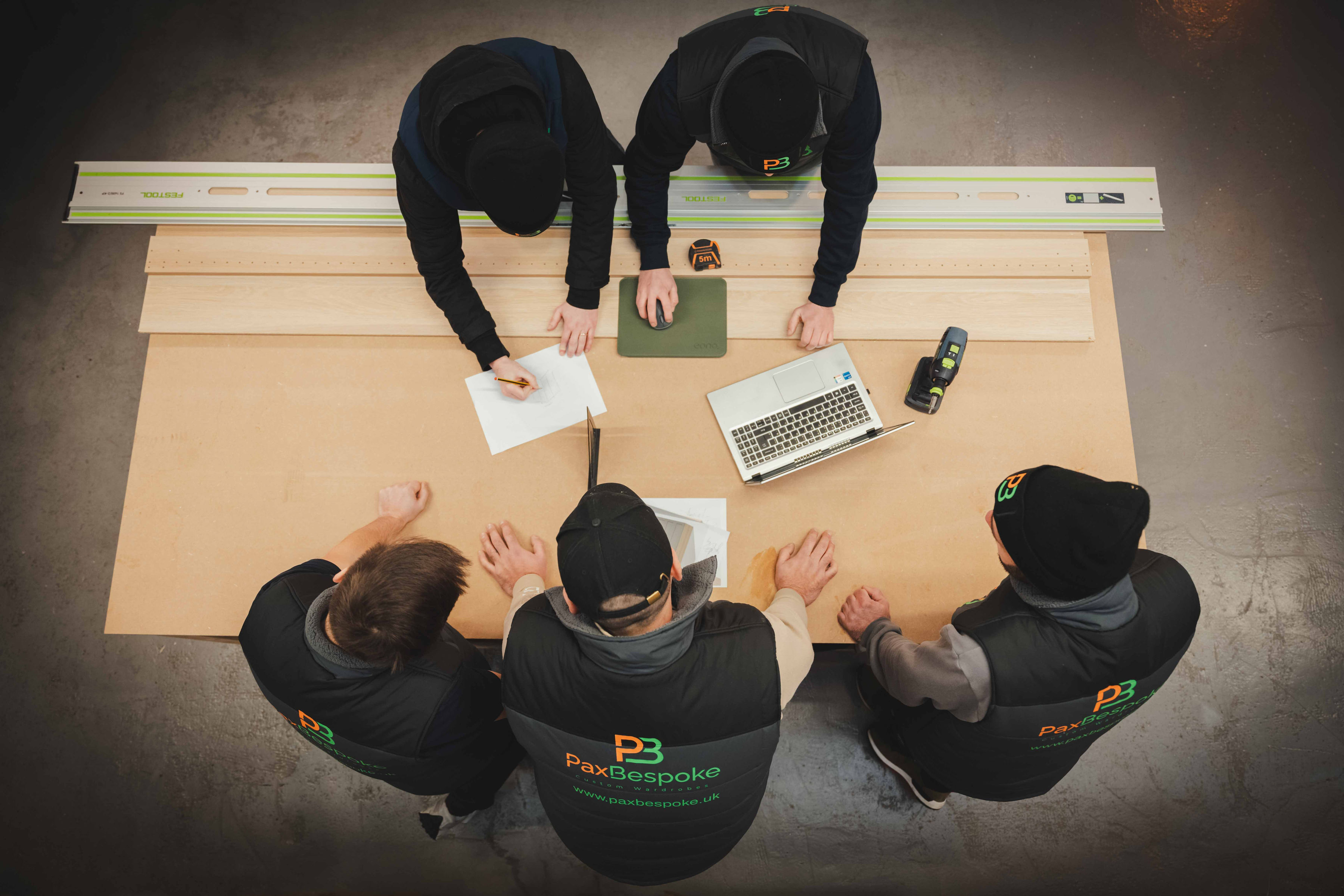 the PaxBespoke team photographed from above