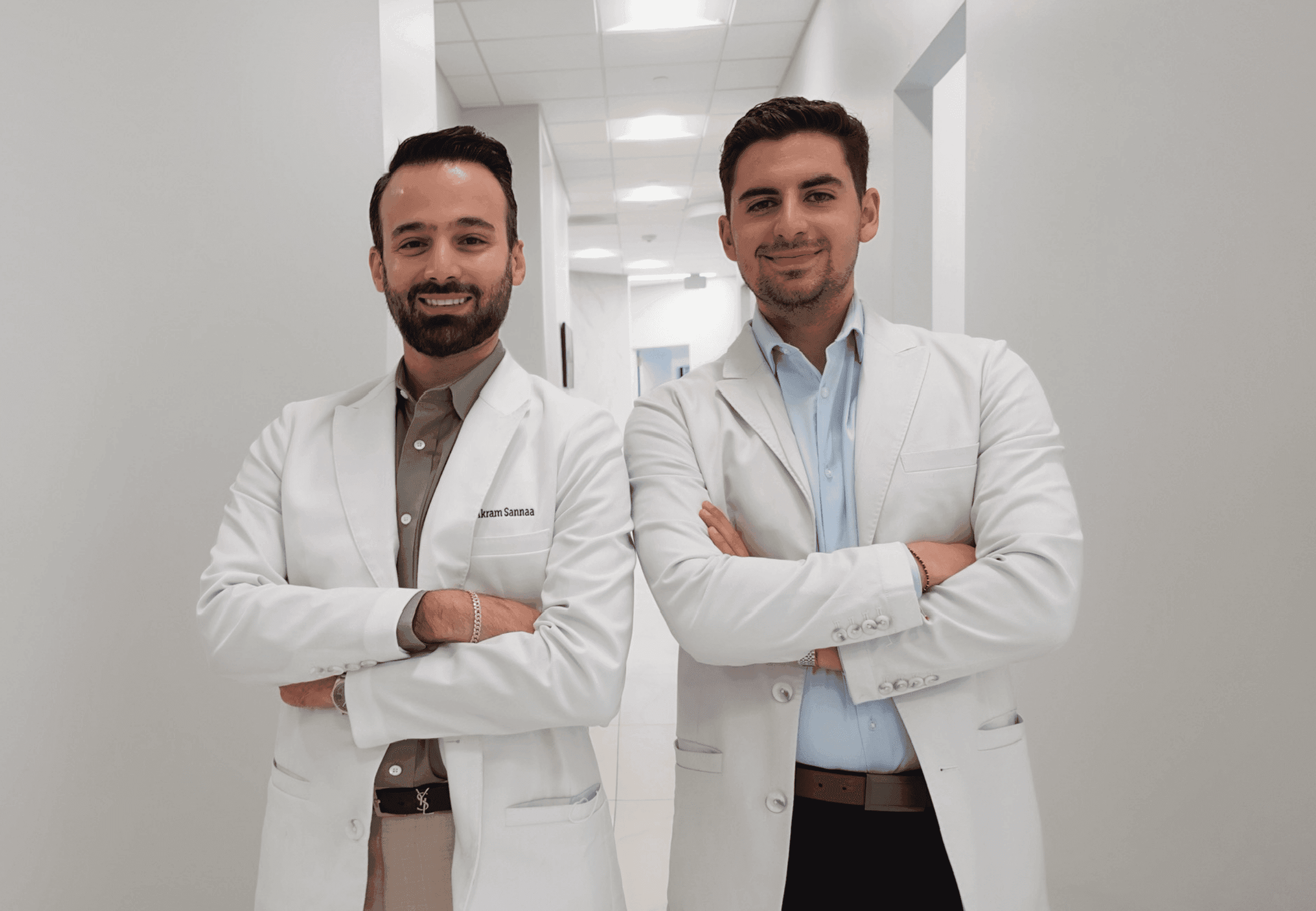 two denstist facing camera