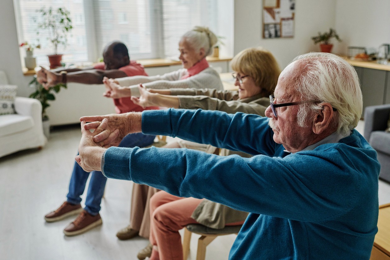 Group wellness activity at assisted living facility