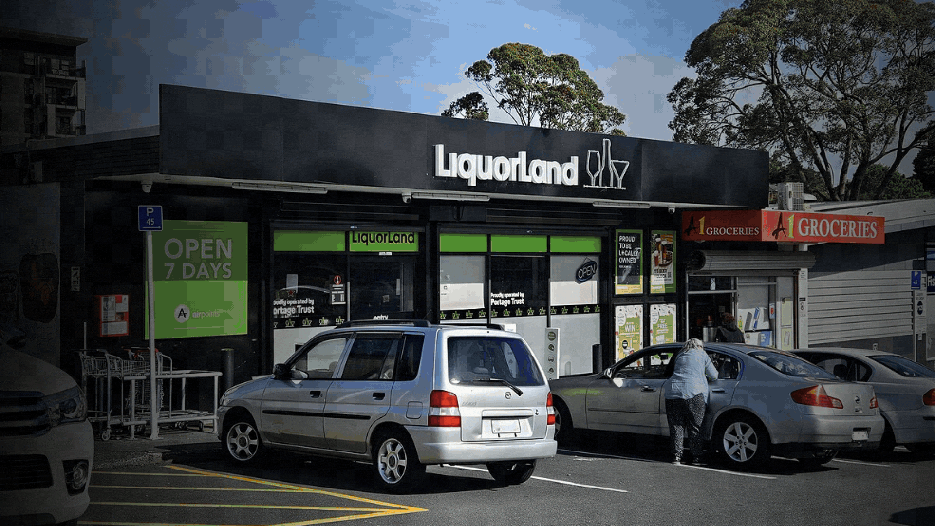 Group of people relaxing outdoors on a field or lawn
