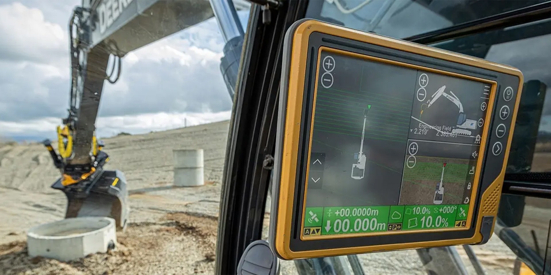 Topcon machine control screen inside an excavator cab showing 3D grading data on a Kansas City jobsite.