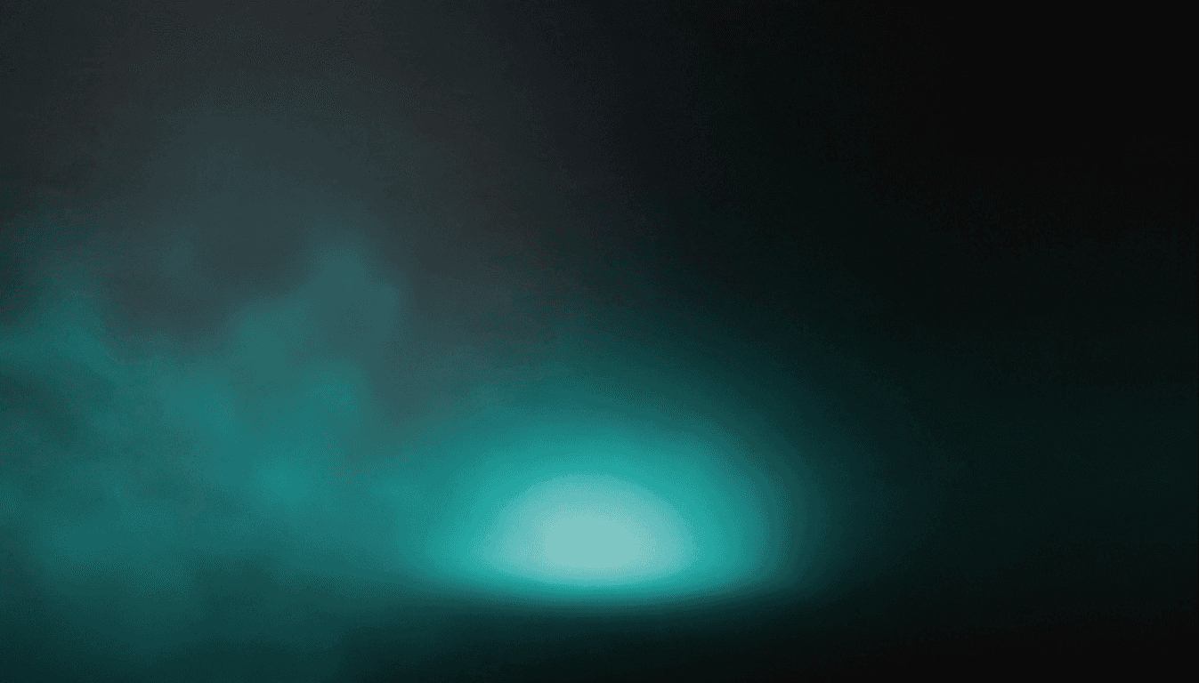 Abstract dark background with soft teal gradient light glowing at the center.