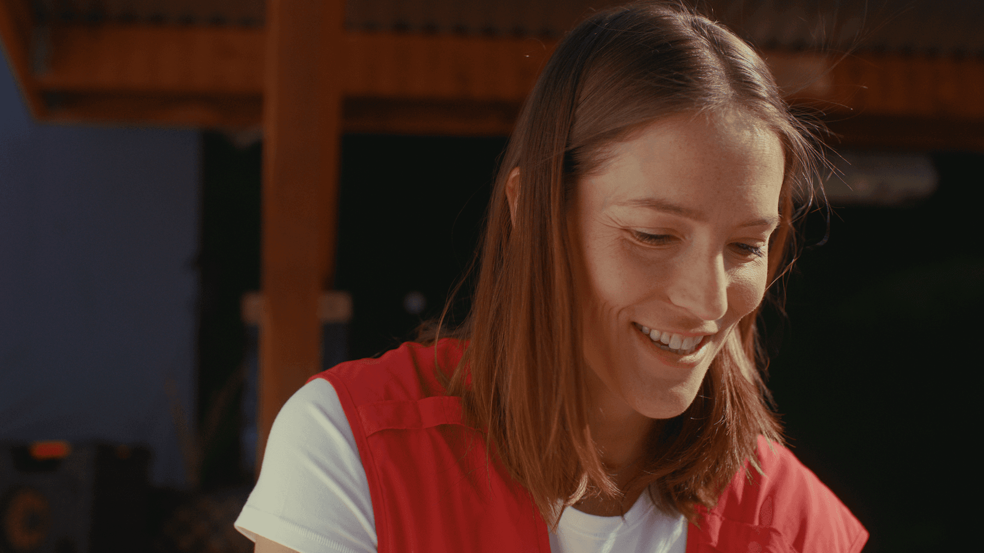 two people in a workspace working on their laptops 
