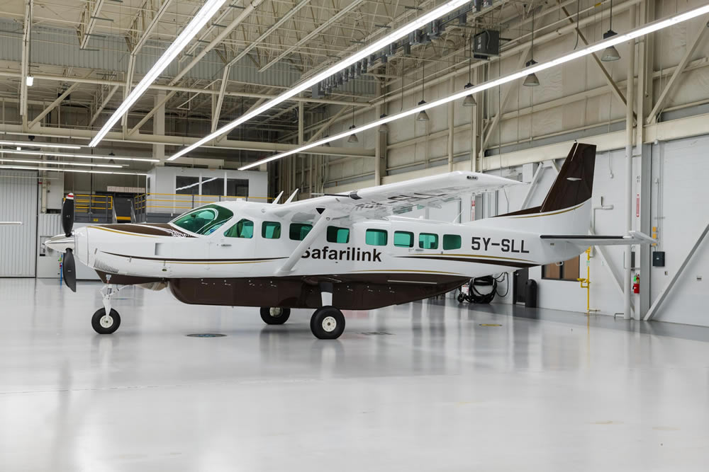 A Safarilink Cessna Caravan configured for scheduled flights to safari airstrips.