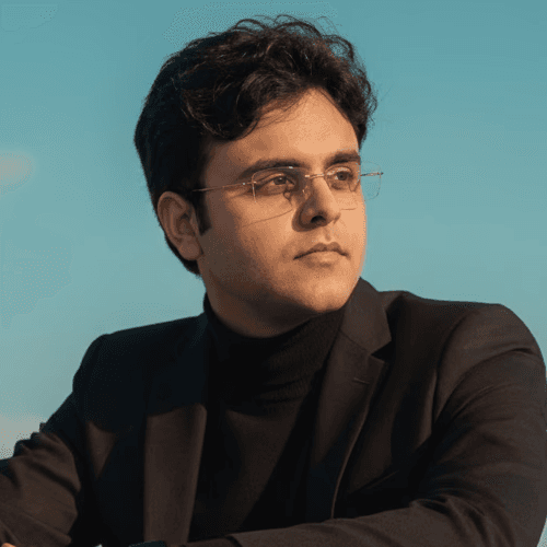 Portrait of a young man on a blue background