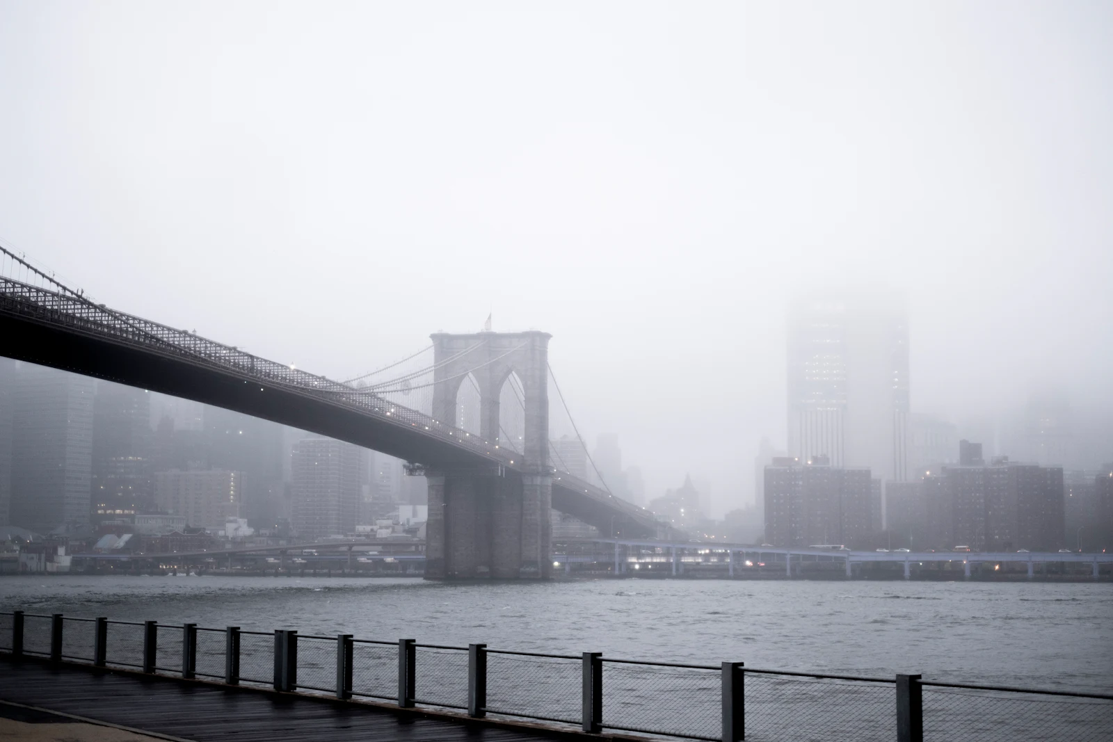 Brooklyn Bridge and the waterfront in fog