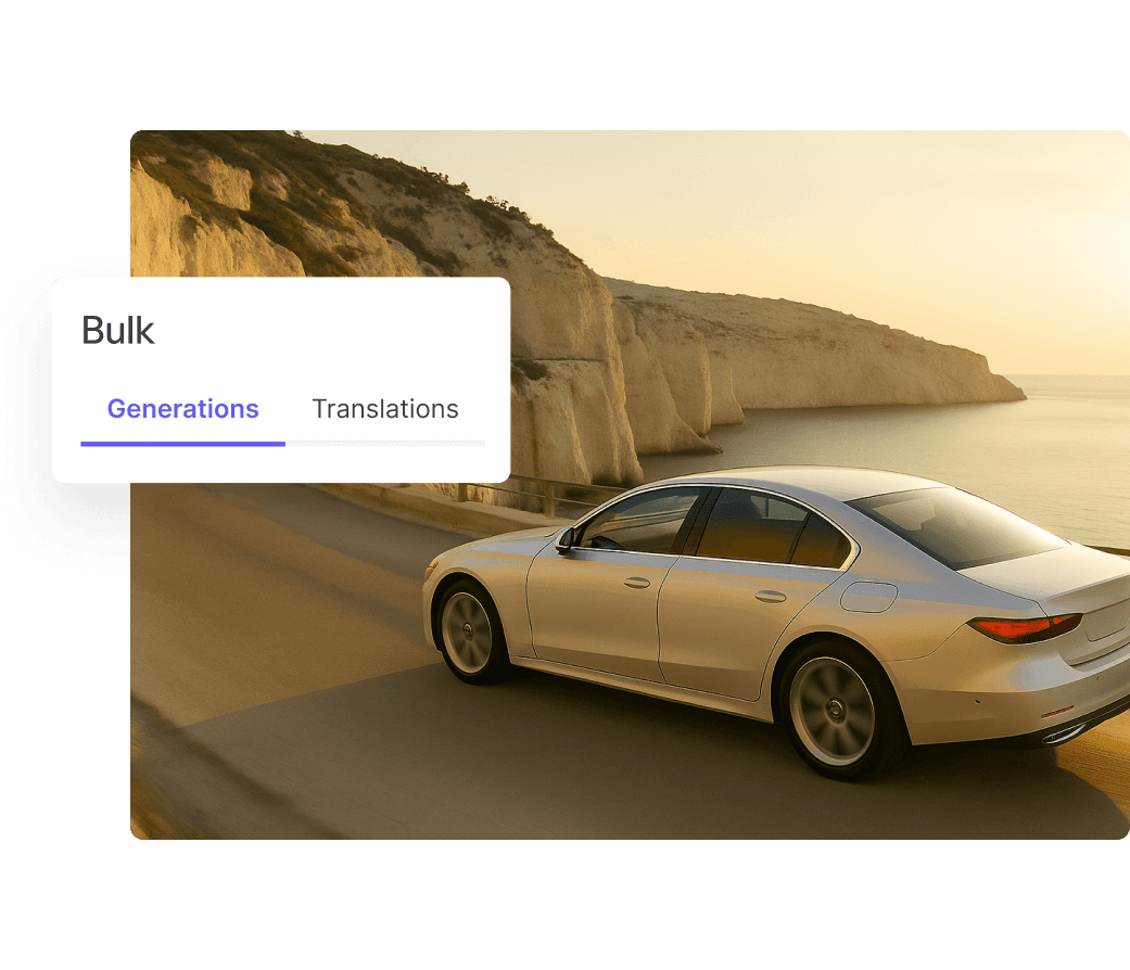 A sleek silver sedan drives along a coastal road with tall cliffs and a golden sunset in the background, showcasing a serene and picturesque landscape.