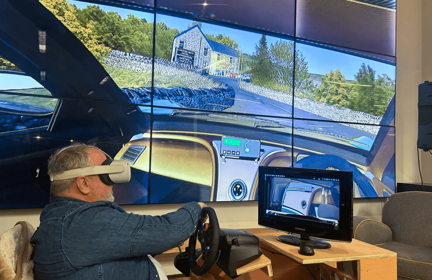 Person playing a handheld video game in an indoor area.