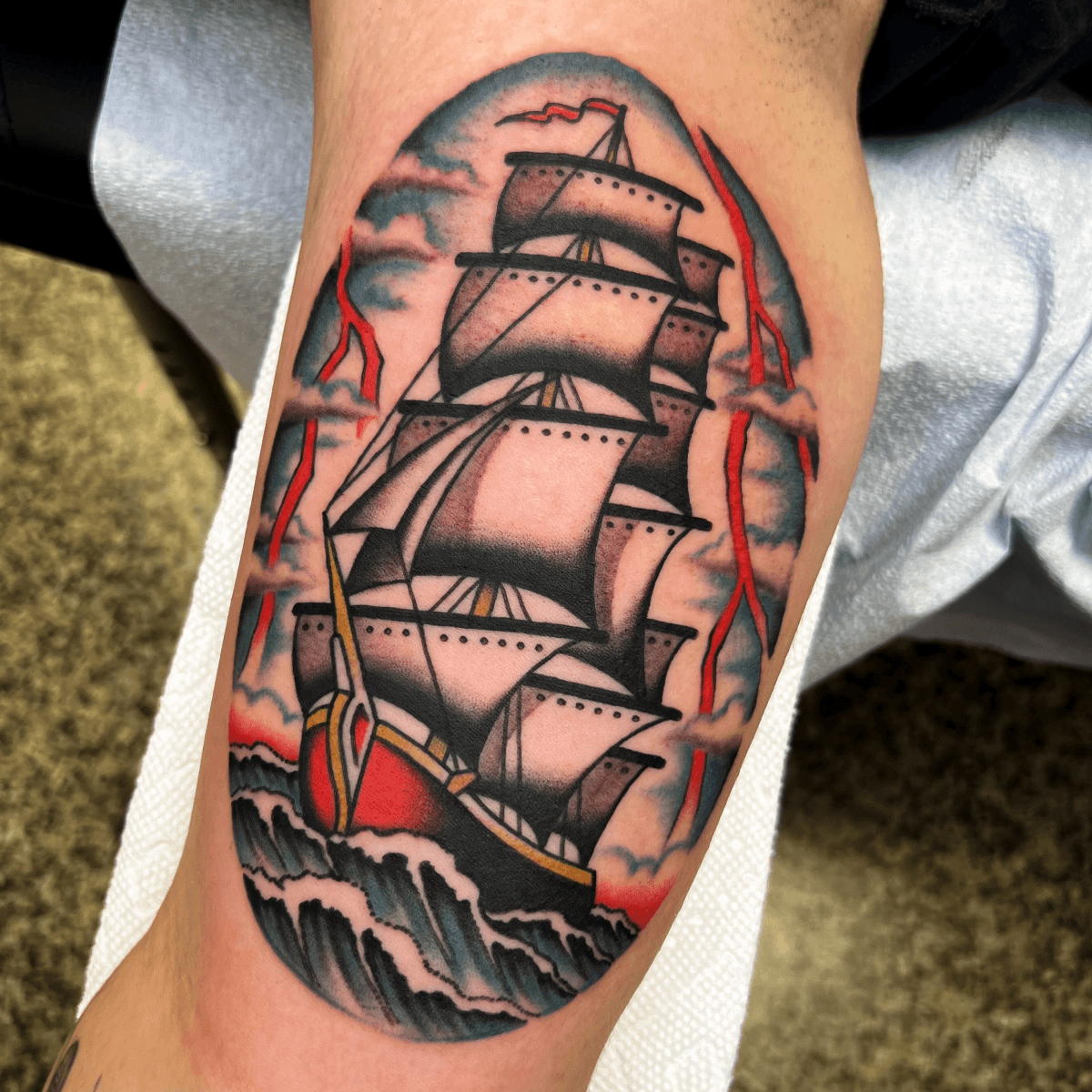 color tattoo of a clipper ship with lightening