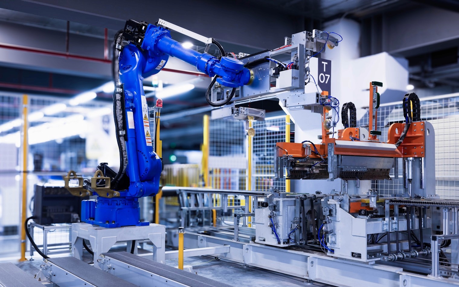 Industrial robotic arm operating inside an automated warehouse facility
