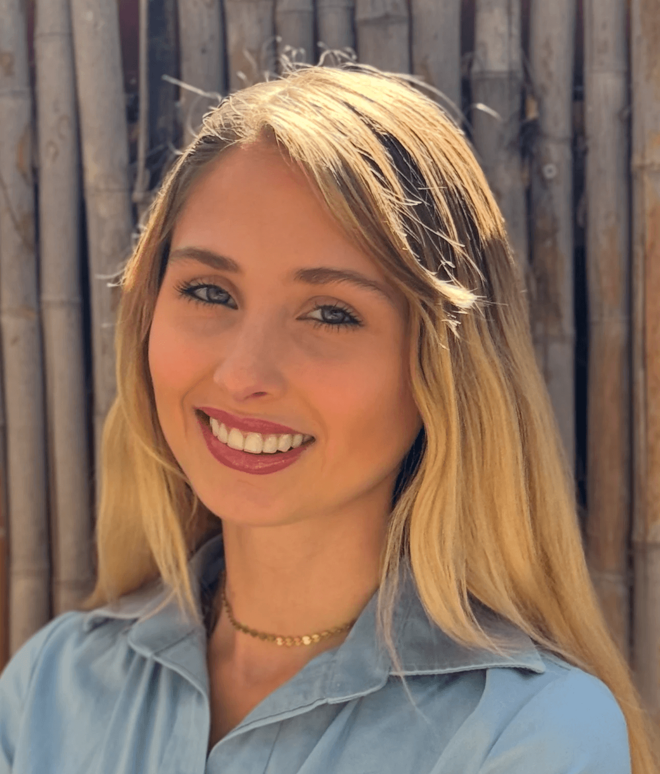 woman with pet smiling fully