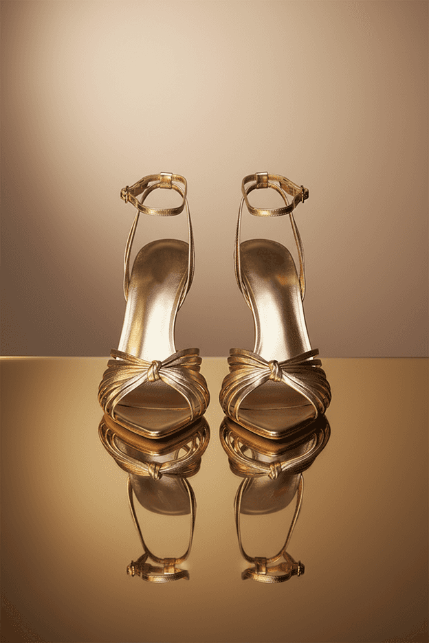 A bottle of dior's nail polish next to a bottle of dior