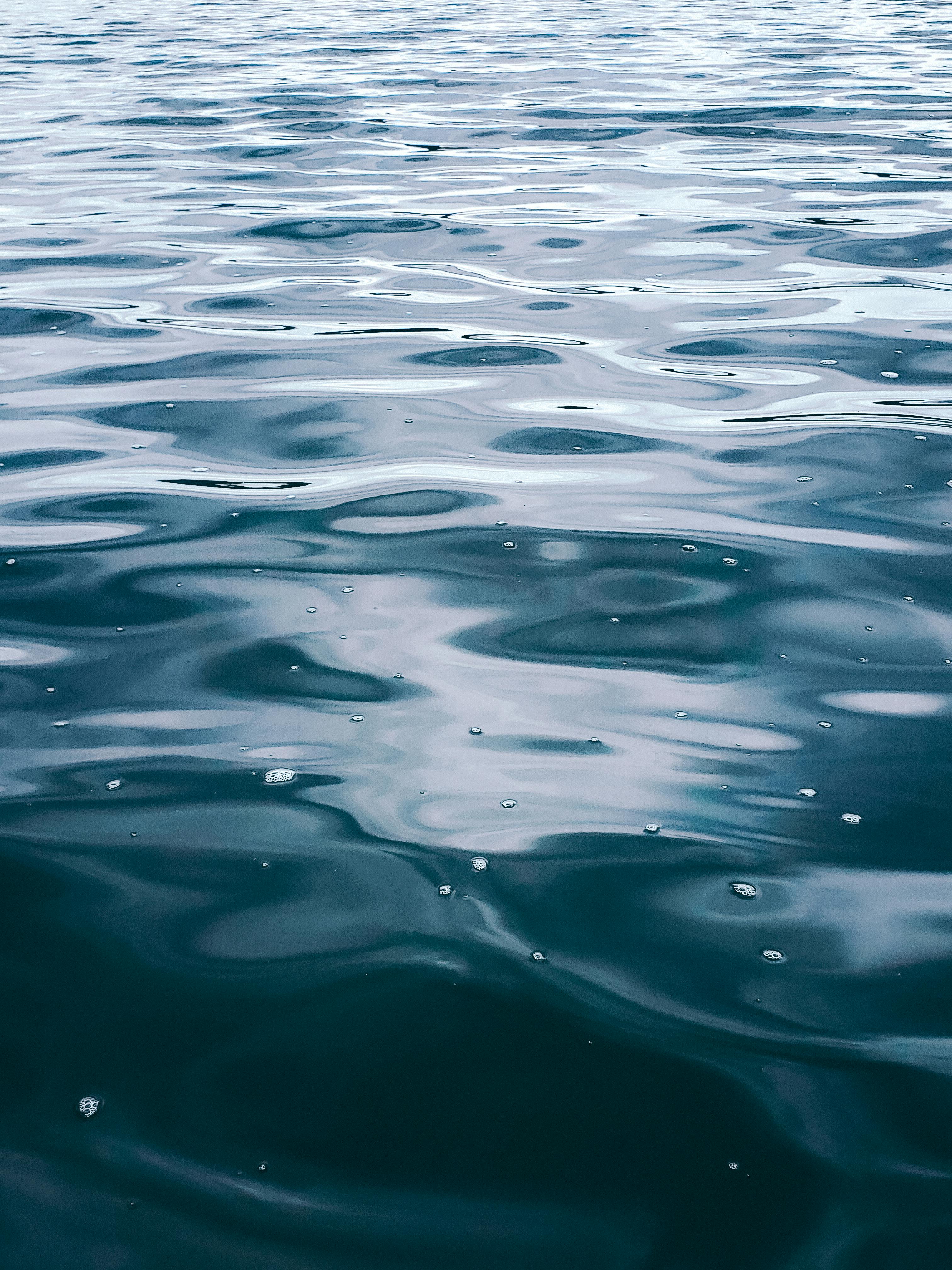 a-tranquil-view-of-ocean-water-surface-with-gentle-ripples-reflecting-the-sky,-c - axel-sandoval (pexels)