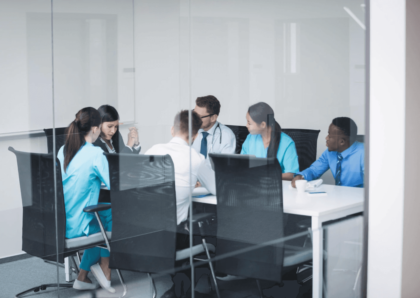 Speaker Presenting at Conference with Audience