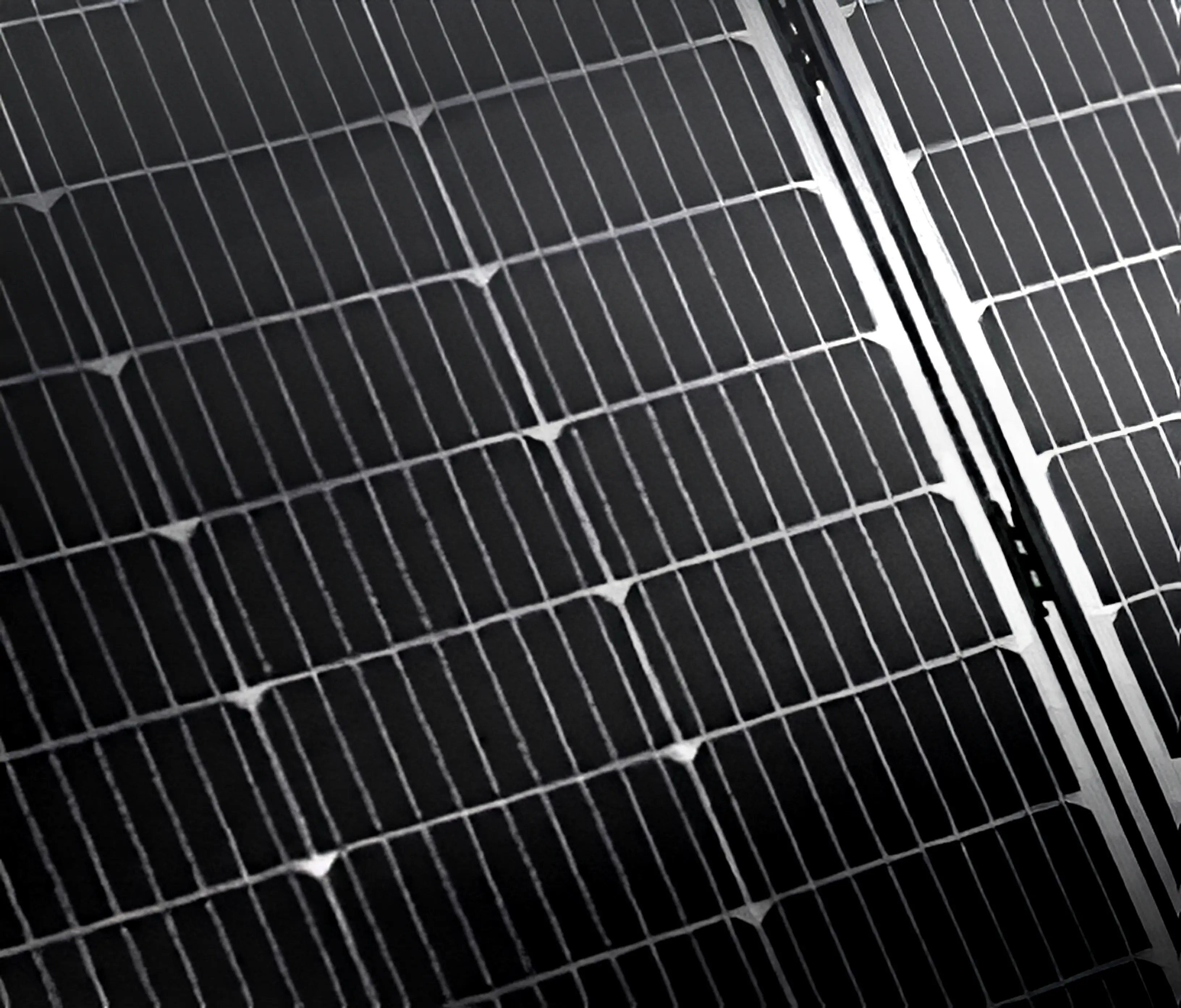 Close up of solar panels with a solar beam over.