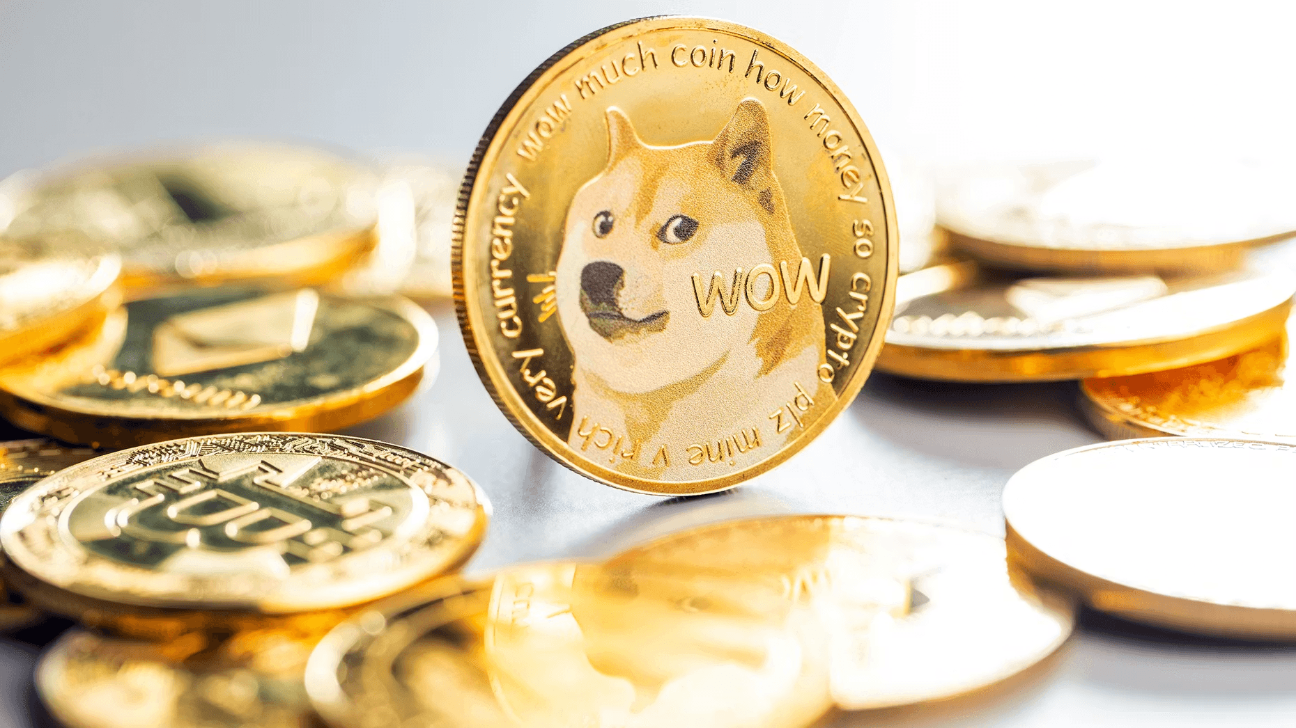  Golden Dogecoin resting on other coins - Best Memecoins