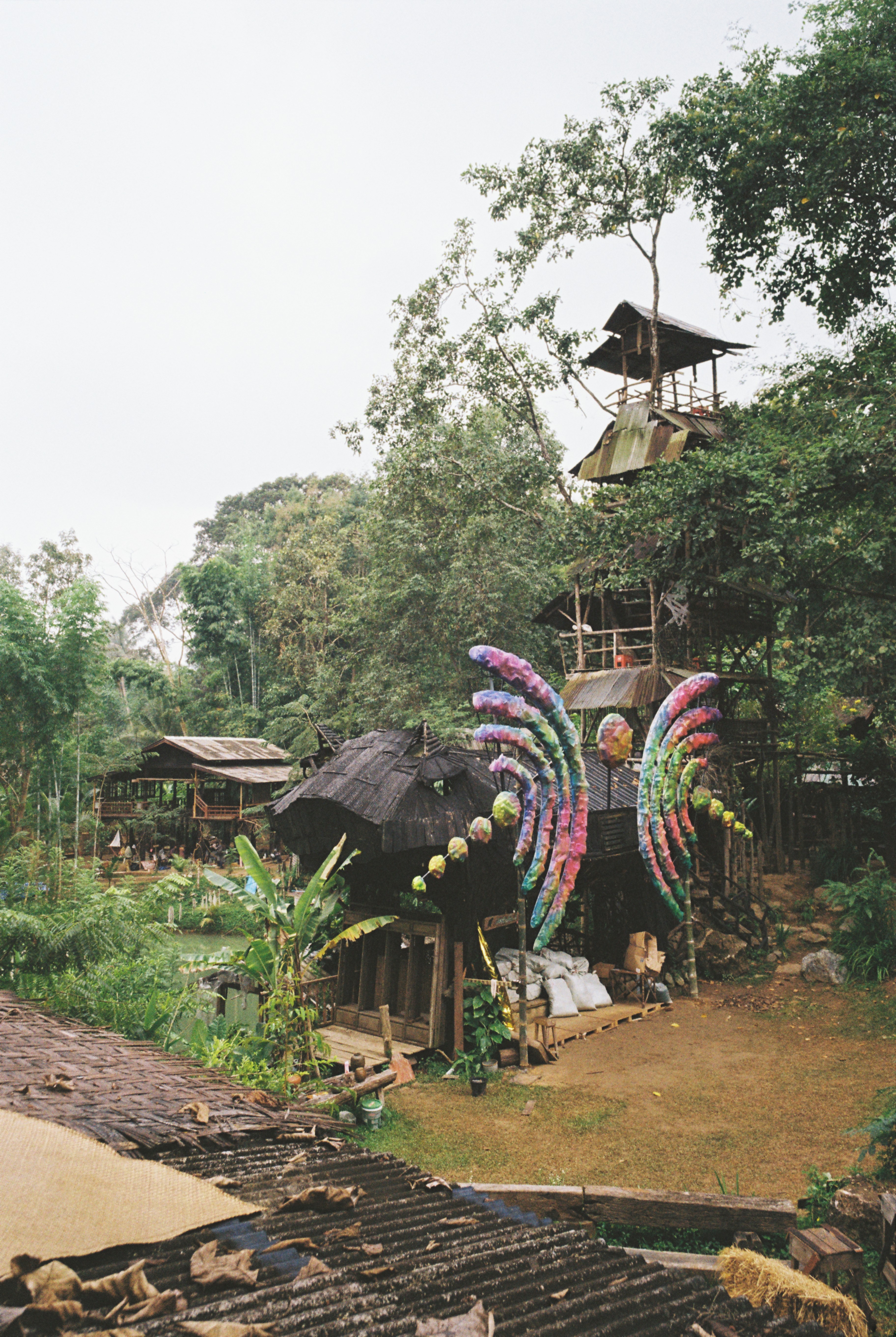 two people looking at a tablet and smiling