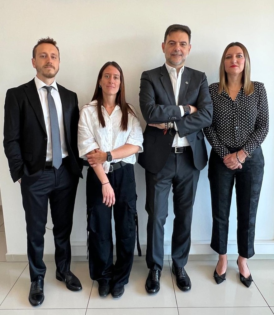 person in black long sleeve shirt holding persons hand