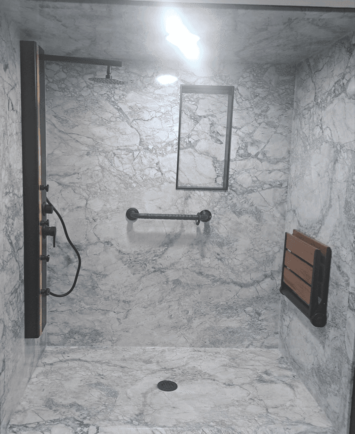 Accessibility Shower Photo with bench seat and grab bars and shower spa
