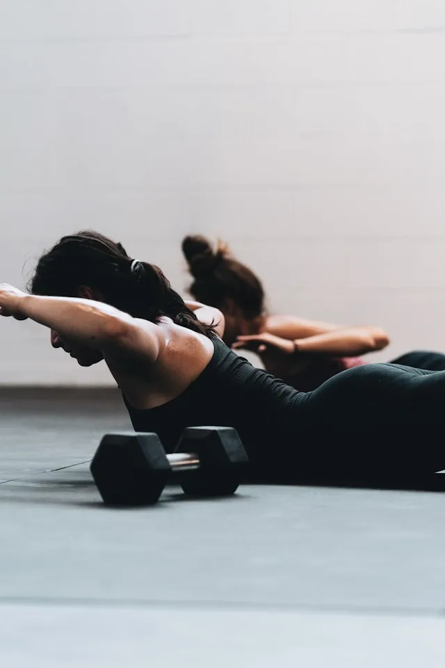 People stretching together during a workout class