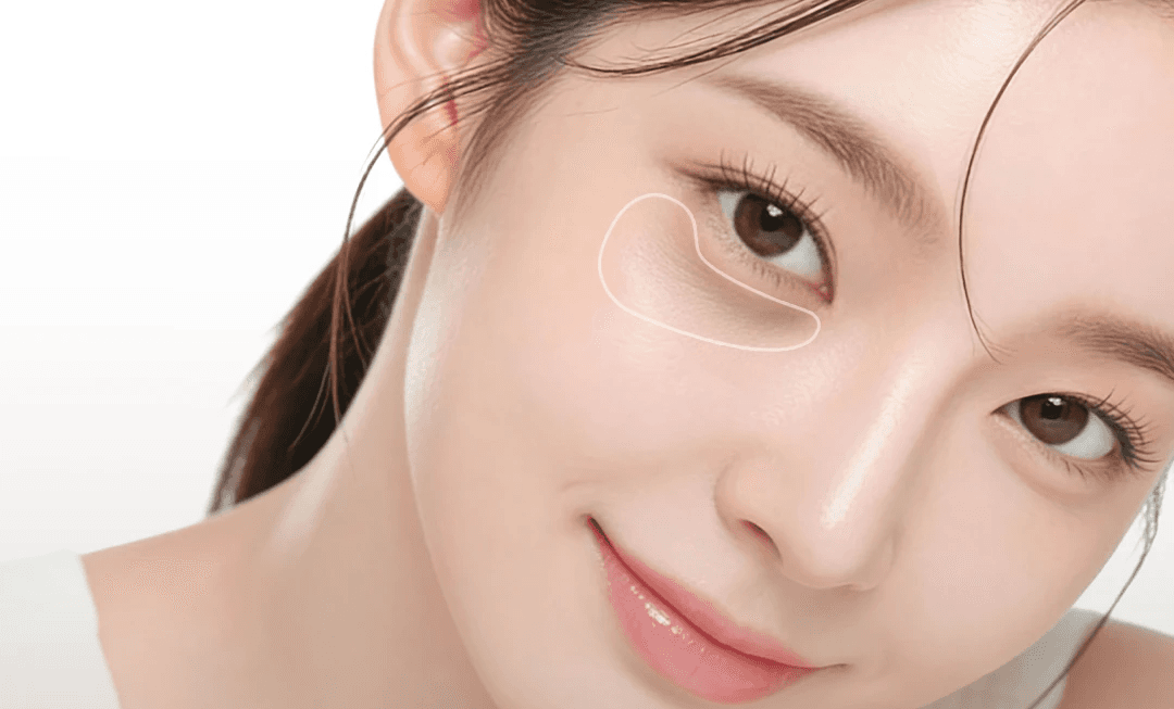Woman with under-eye patch skincare treatment
