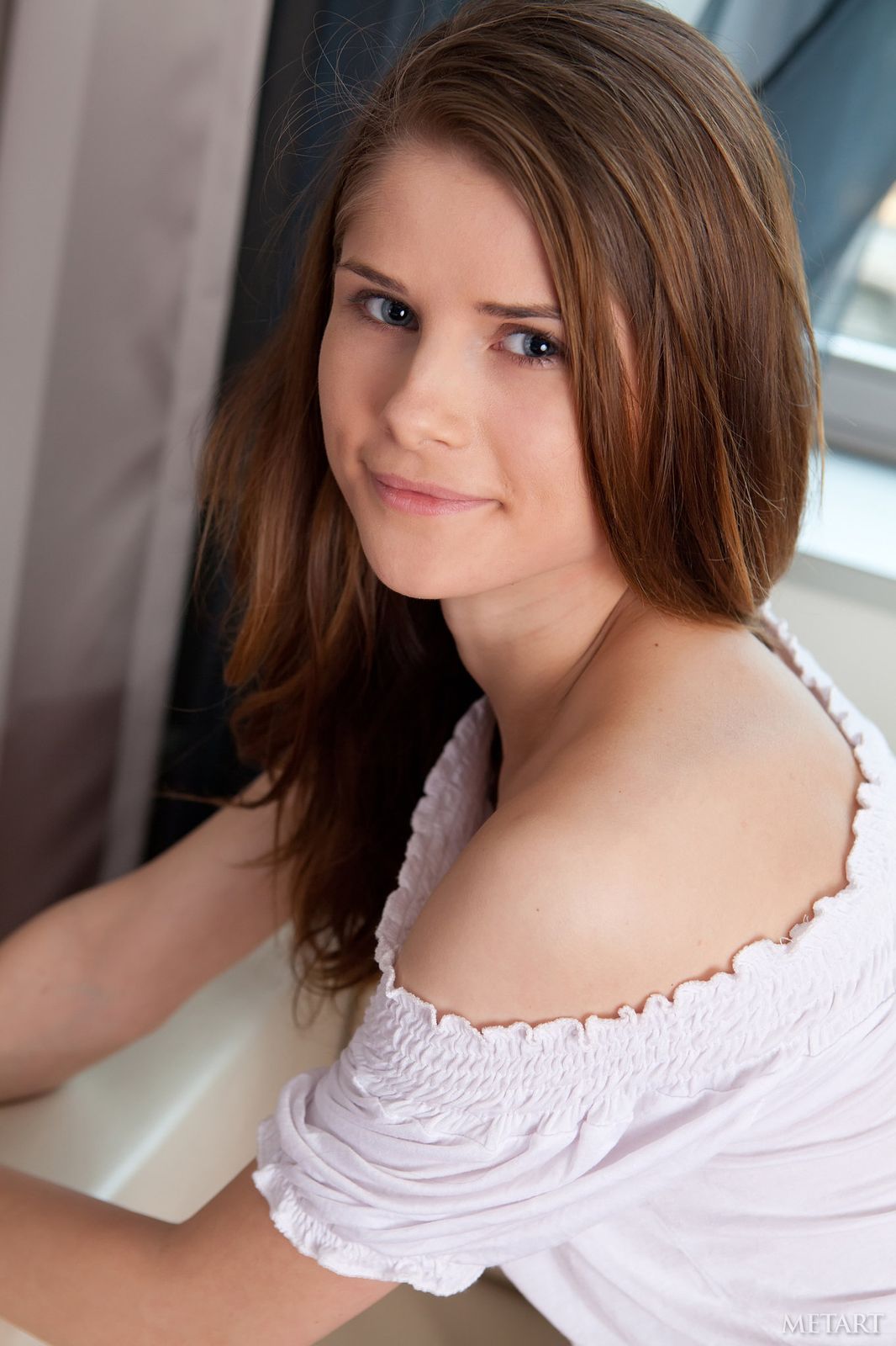 husband and wife working happily on a laptop