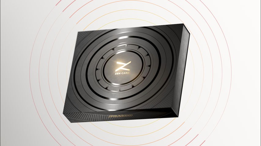 A black gift box hovers in a brightly lit environment, it has gold and black engravings on top 
