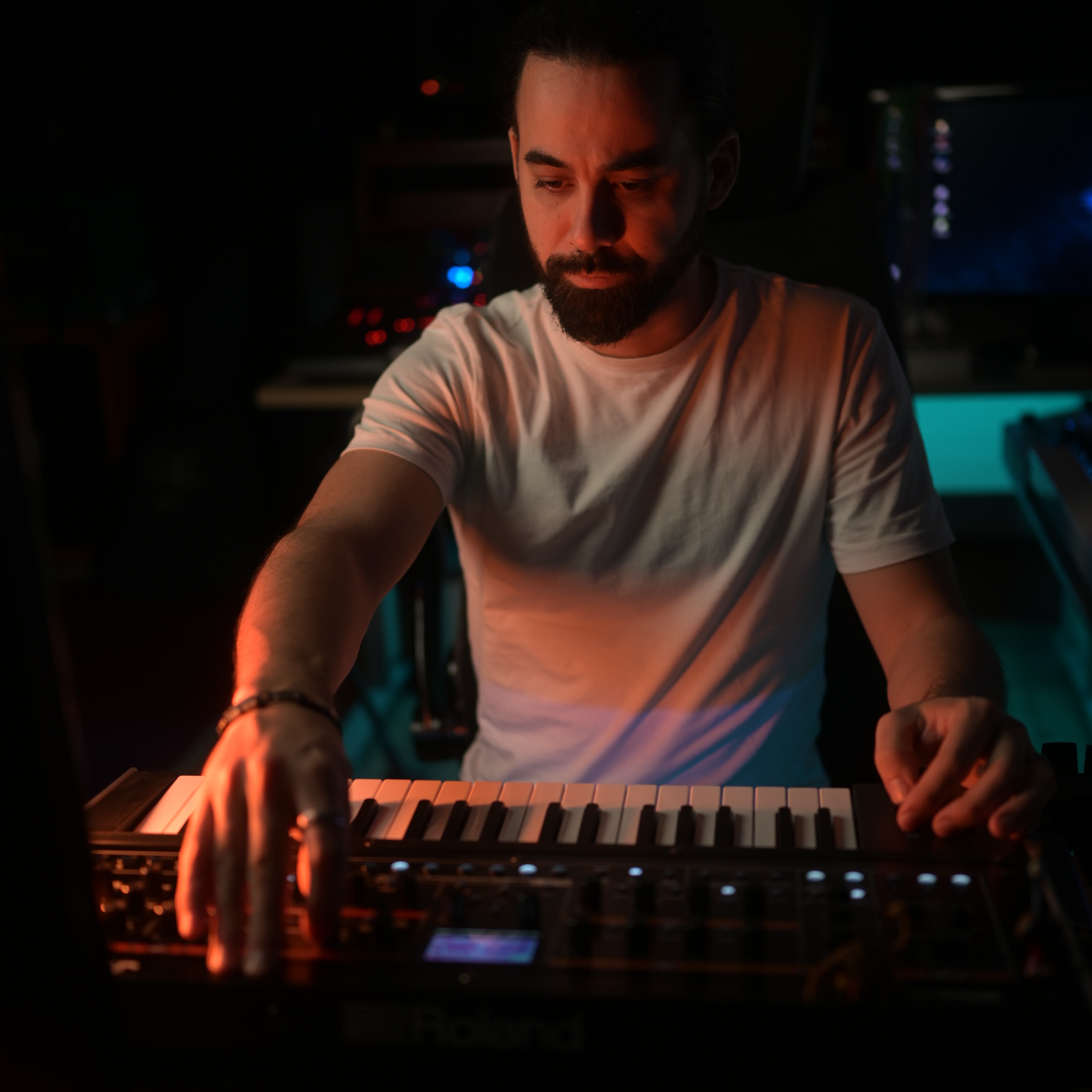 Music producer sitting in his studio