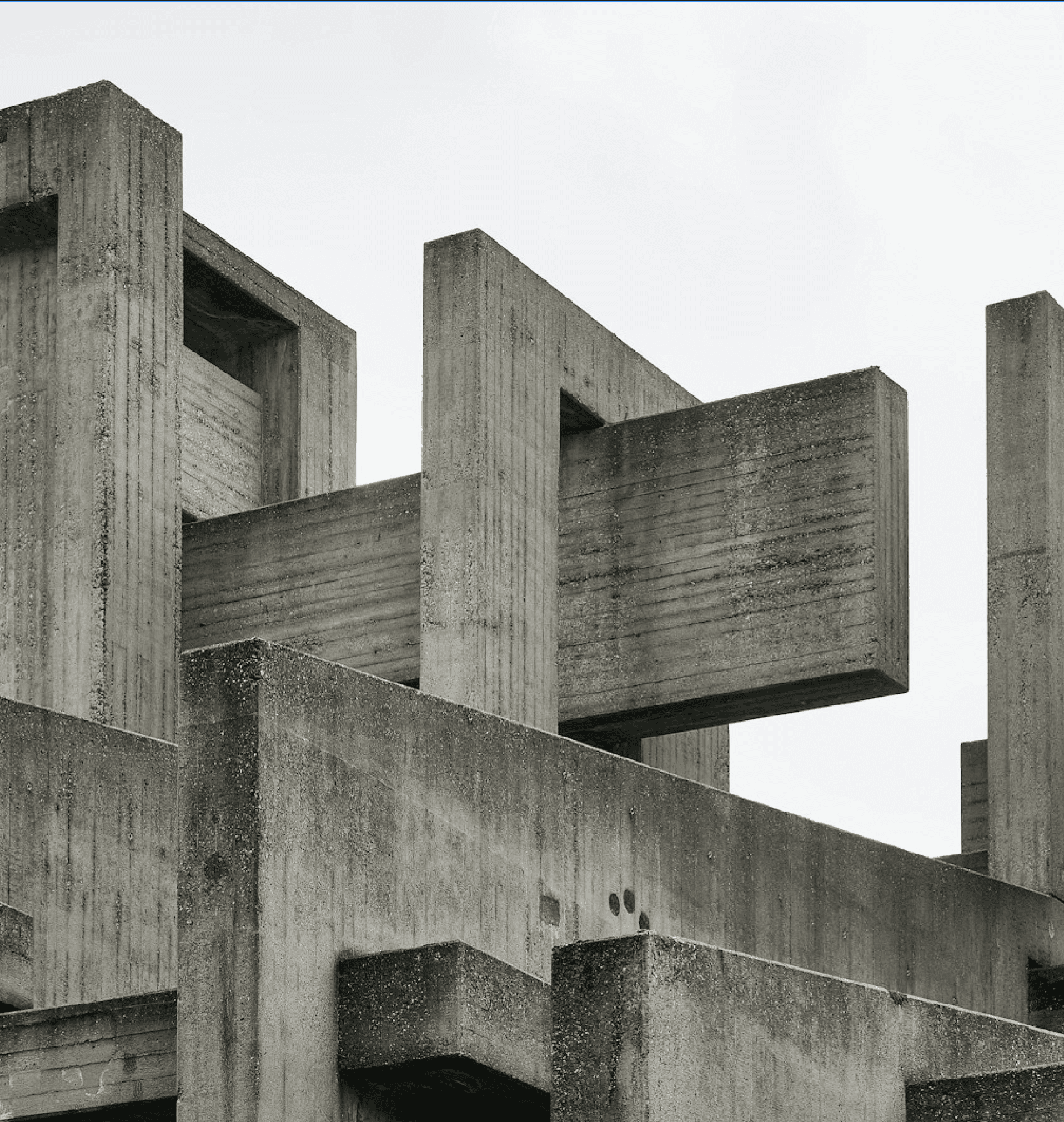 Cover photograph of brutalist concrete architecture for the article "The Surprise Within: What Life Inside Brutalist Walls Feels Like".