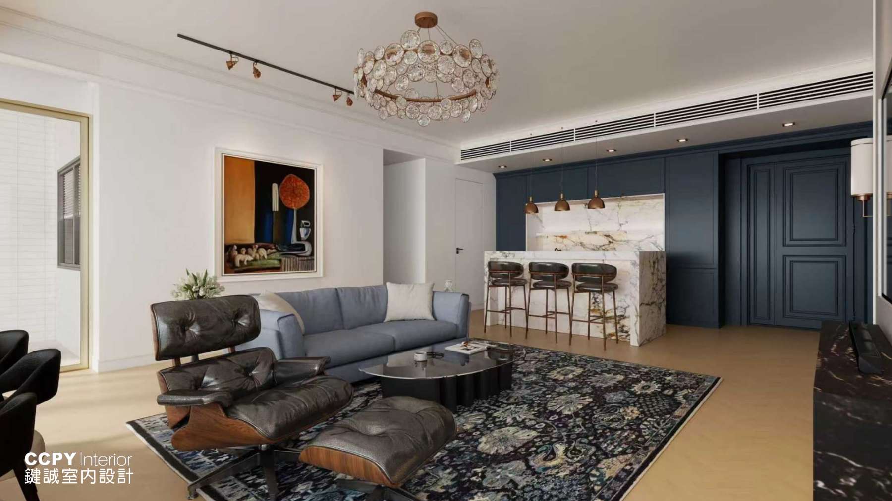 A luminous luxury house interior at Mount Pavilia featuring a blue velvet sofa, an Eames-style lounge chair, and a grand crystal chandelier.