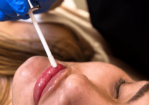 Woman receiving cosmetic skin treatment