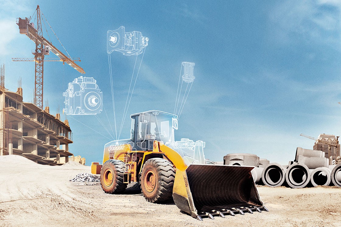 Manipulated photo of a shovel with an artist impressions of related Danfoss components