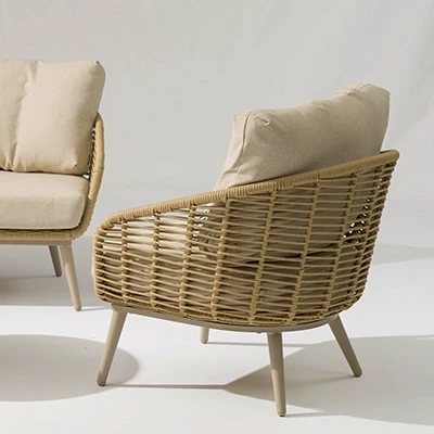 Stylish Vinci COCO garden sofa with beige cushions for outdoor relaxation.