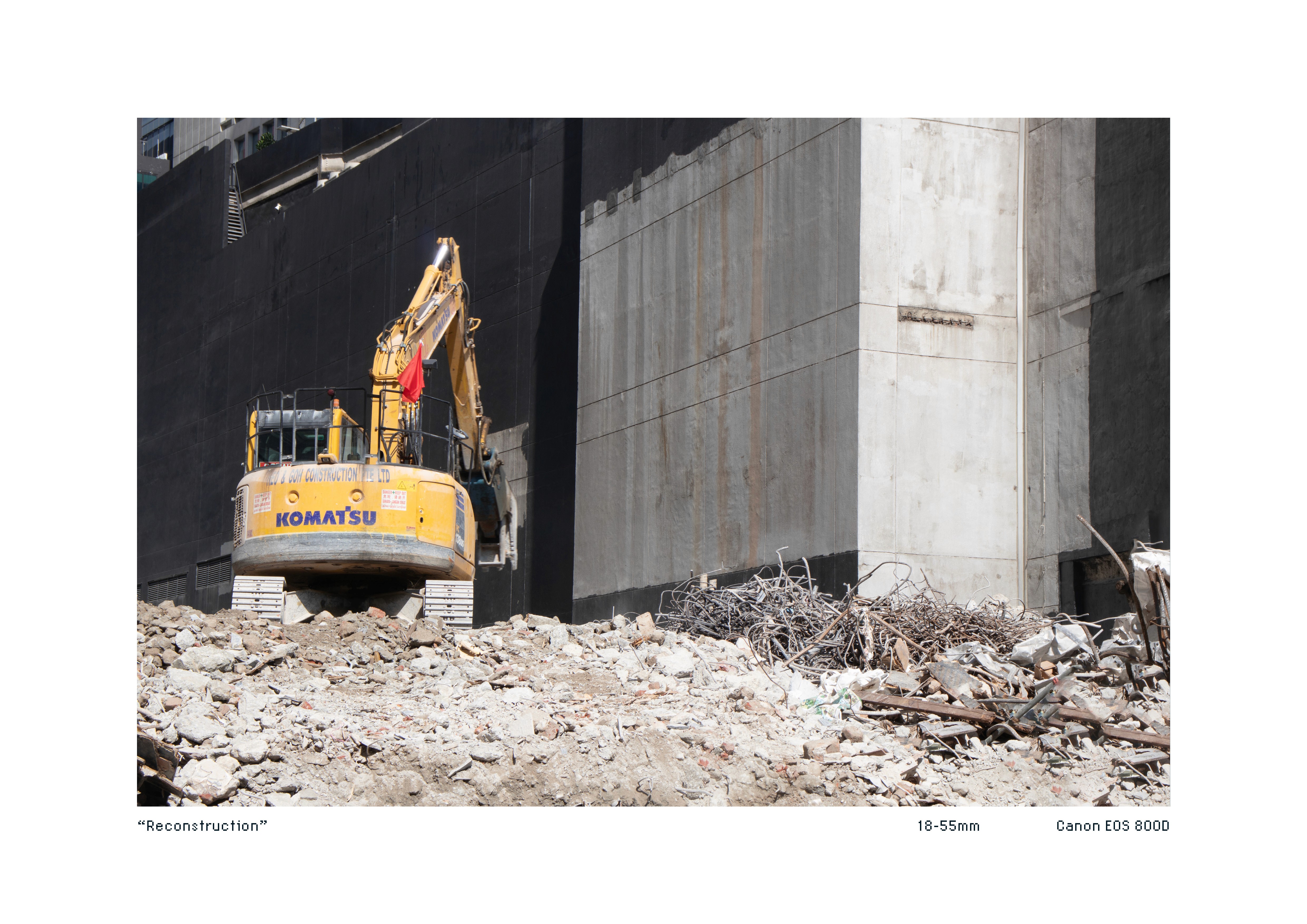 A excavator being used to destroy buildings