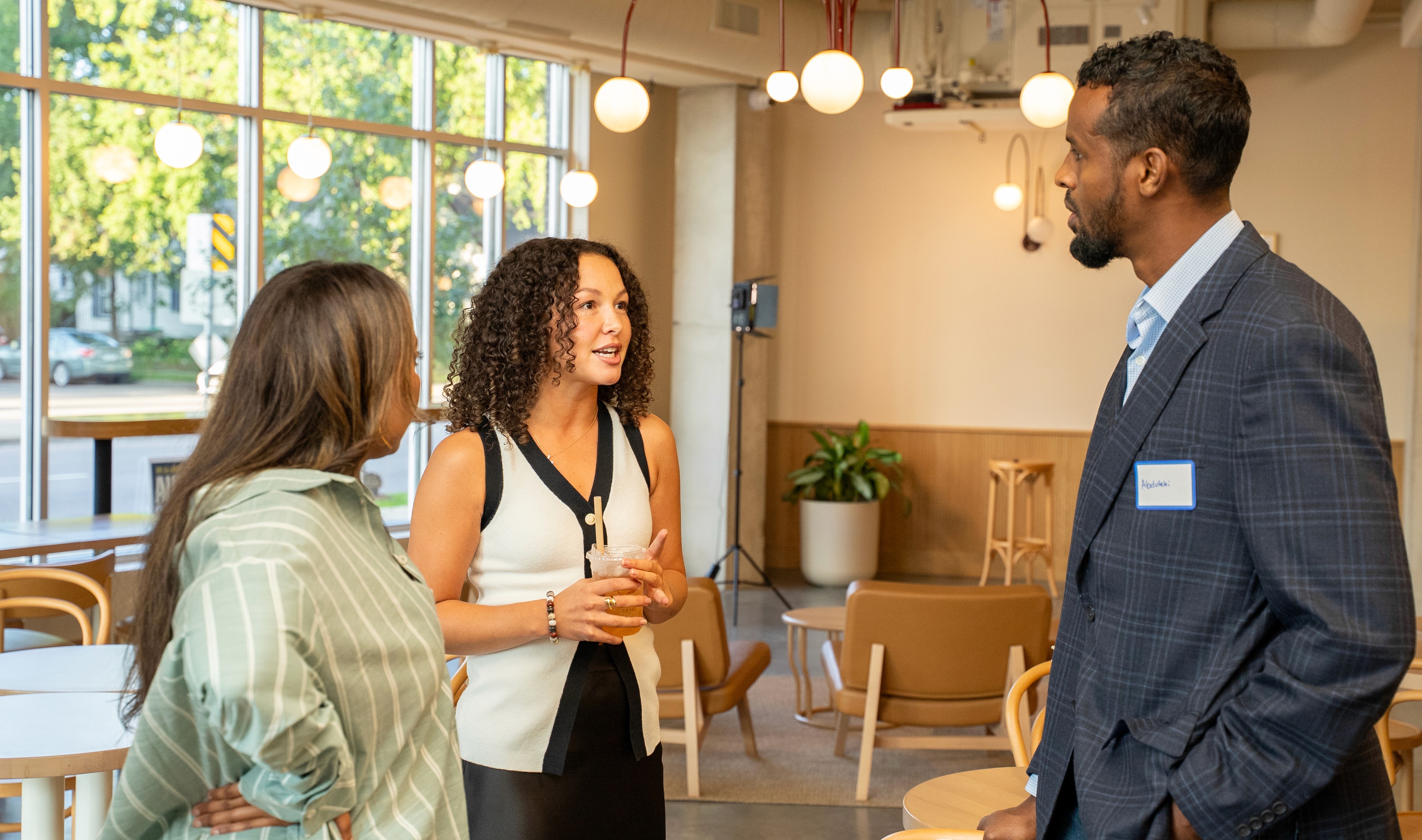 woman in white shirt wearing white helmet