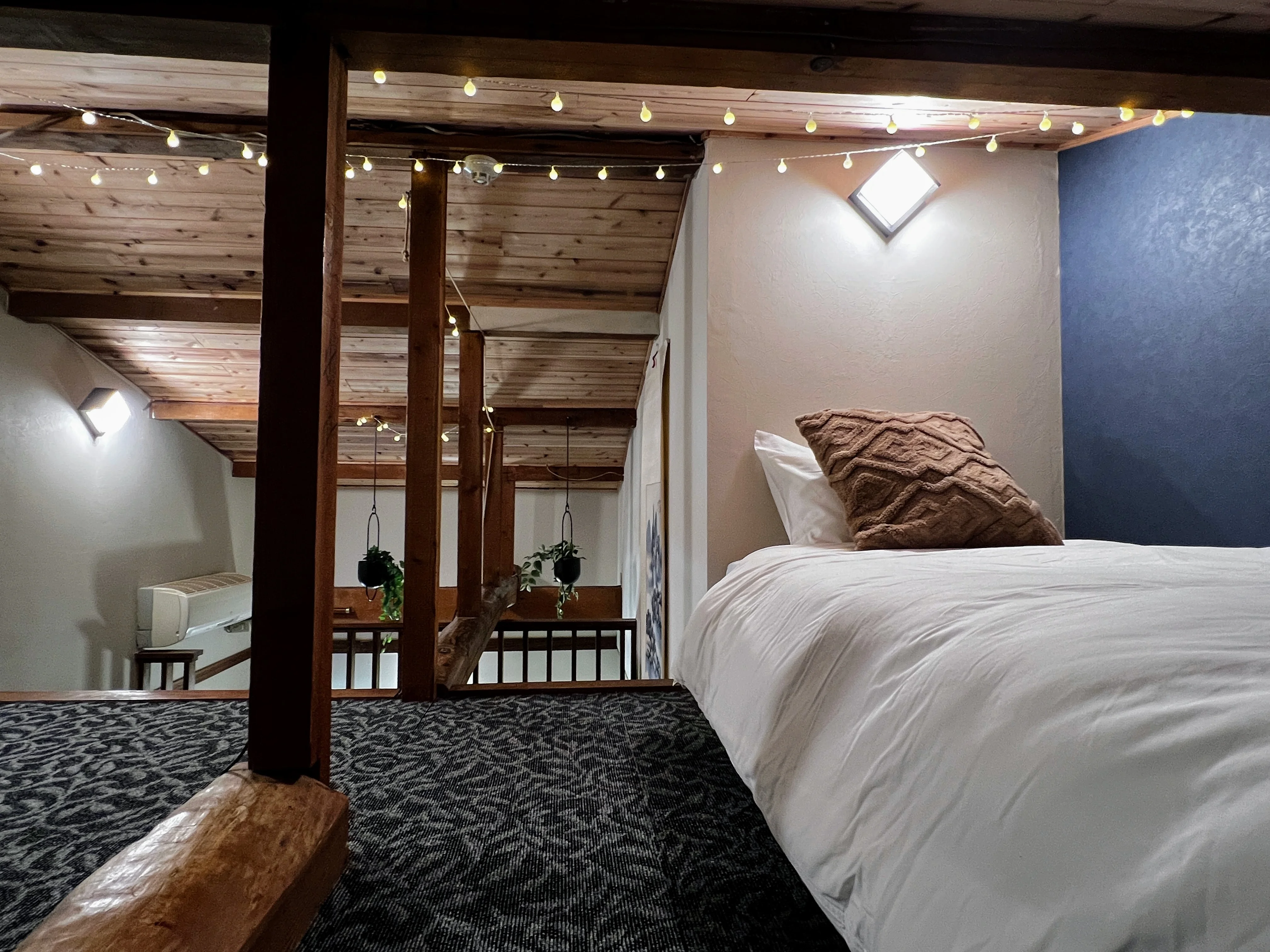 This room features a modern, Western-style layout with twin beds that can be configured as a king. Perfect for guests looking for comfort and flexibility.