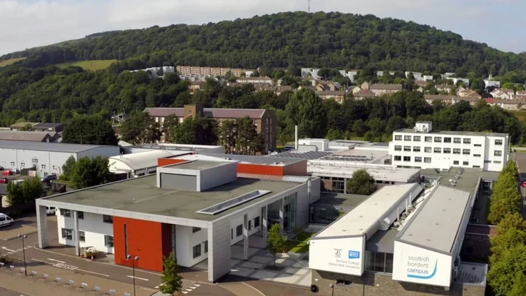 Aerial view of the Scottish Borders Campus surrounded by woodland and hillside landscape.
