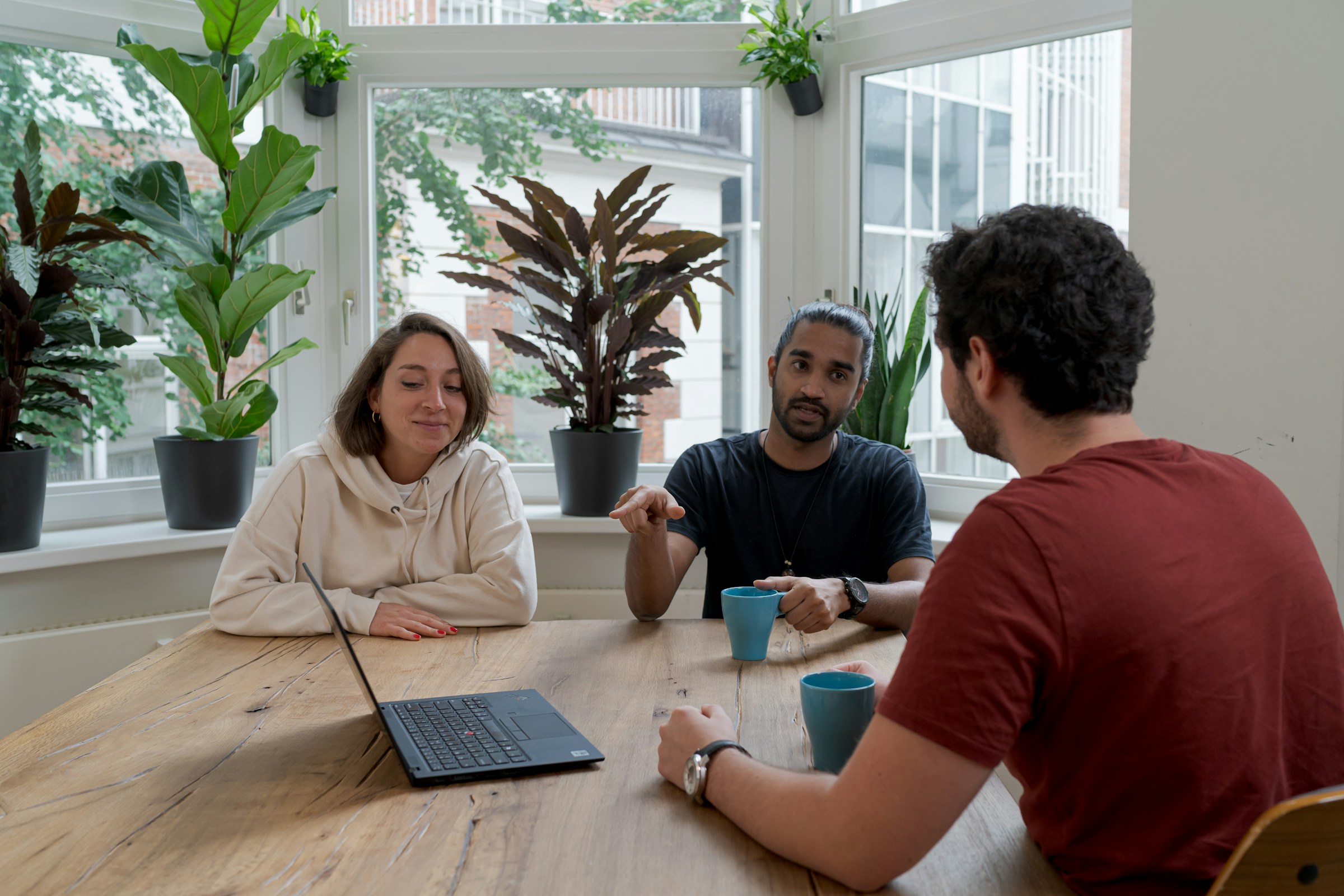 team discussing ideas for shorts - Short Form Videos