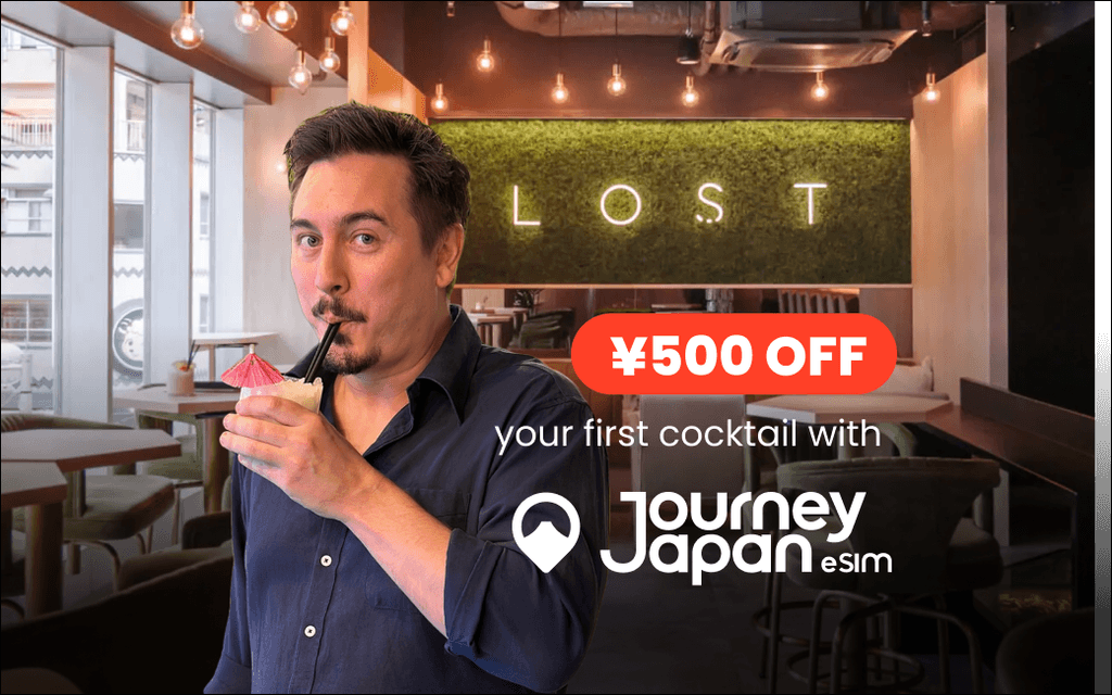 Chris drinking a 500JPY off cocktail after using Journey Japan eSIM discount